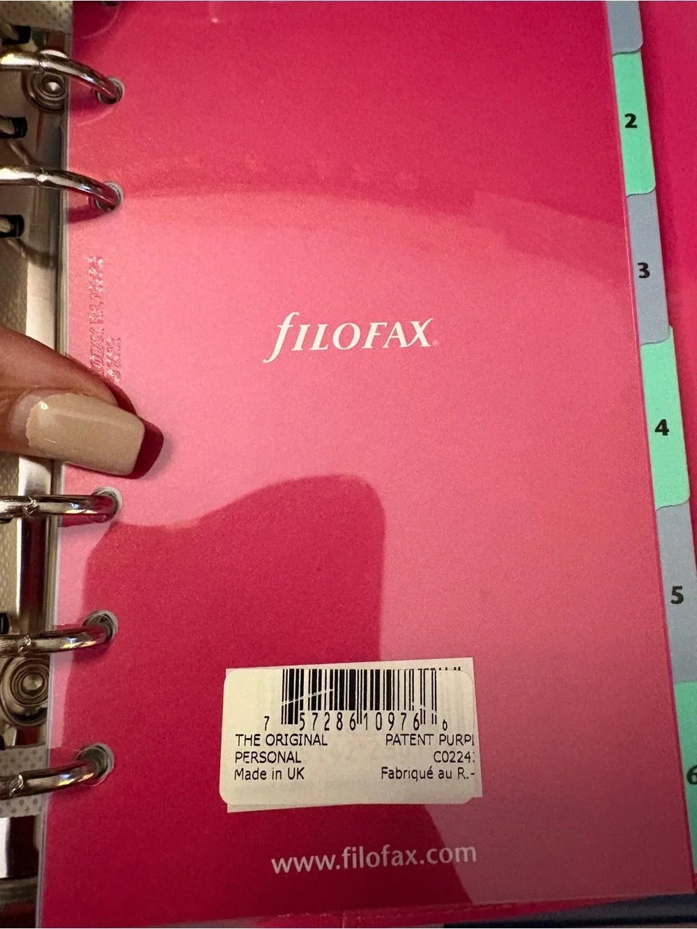 Filofax domino in pink, patent leather, personal size.